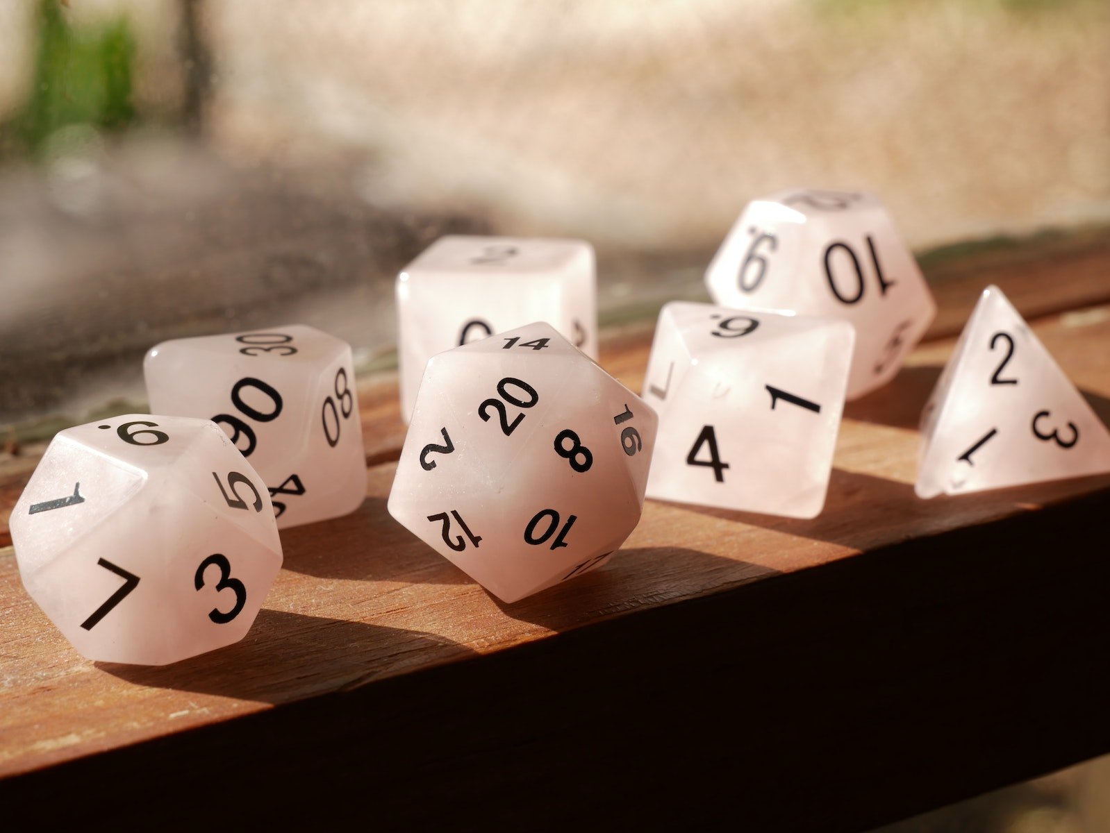 Thank You – DnDTomb.com Reaches over 1 Million Views! 1 Polyhedral Dice on Wooden Surface